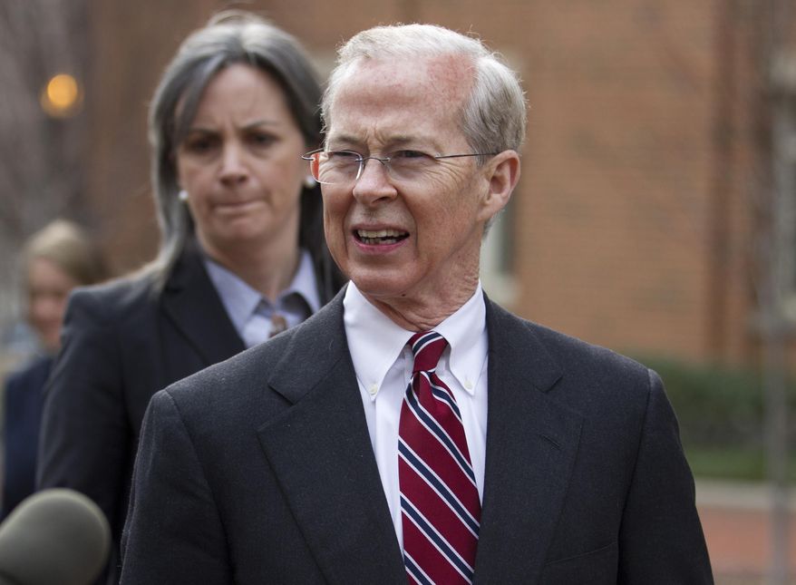 FILE - In this Jan. 26, 2012 file photo Dana Boente, First Assistant U.S. Attorney for the Eastern District of Virginia leaves federal court in Alexandria, Va. Boente, the man appointed to serve as acting attorney general after his predecessor refused to defend President Trump's travel ban, has a reputation for providing steady leadership in difficult situations and was described by then-Attorney general Loretta Lynch as one of the Justice Department's "consummate utility players." (AP Photo/Evan Vucci, File)