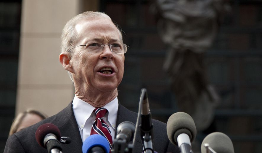 In this Jan. 26, 2012, file photo, Dana Boente, first assistant U.S. attorney for the Eastern District of Virginia, speaks outside federal court in Alexandria, Va. (AP Photo/Evan Vucci, File)