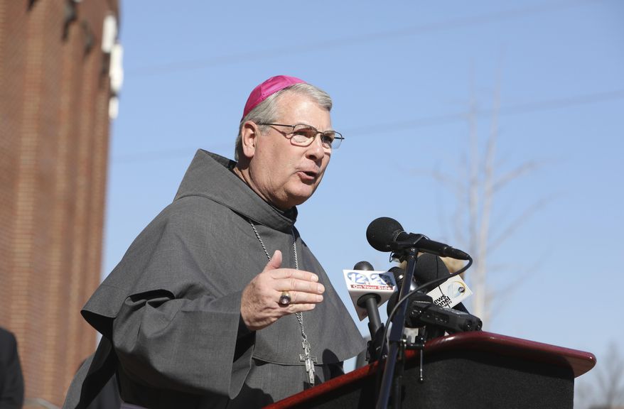 Bishop Gregory Hartmayer speaks during a news conference at the Richmond County Courthouse on Tuesday, Jan. 31, 2017, in Augusta, Ga. The Bishop along with Bishop Felipe Estevez and Archbishop Wilton Gregory gathered to ask the district attorney to not seek the death penalty in the case against Steven James Murray, who is accused of killing the Rev. Rene Robert. (AP Photo/Heidi Heilbrunn)