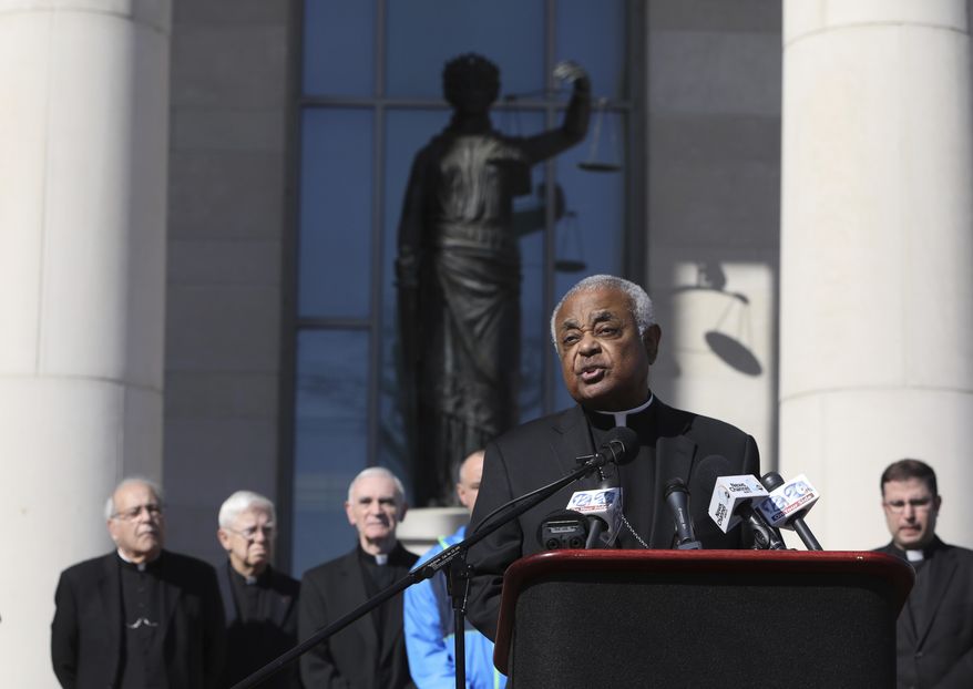 Archbishop Wilton Gregory of the Archdiocese of Atlanta speaks during a news conference at the Richmond County Courthouse on Tuesday, Jan. 31, 2017, in Augusta, Ga. The Archbishop along with bishops Felipe Estevez and Gregory Hartmayer gathered to ask the district attorney to not seek the death penalty in the case against Steven James Murray, who is accused of killing the Rev. Rene Robert. (AP Photo/Heidi Heilbrunn)