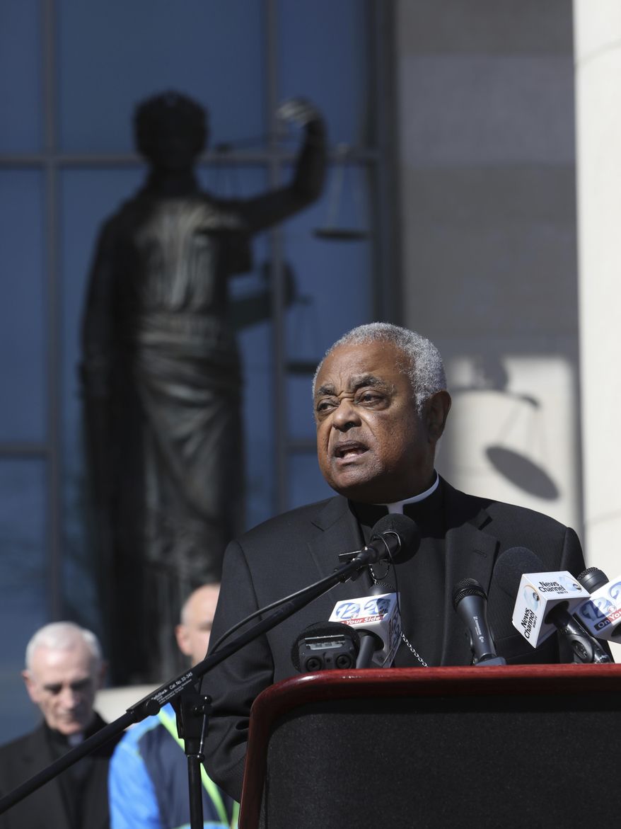 Archbishop Wilton Gregory of the Archdiocese of Atlanta speaks during a news conference at the Richmond County Courthouse on Tuesday, Jan. 31, 2017, in Augusta, Ga. The Archbishop along with bishops Felipe Estevez and Gregory Hartmayer gathered to ask the district attorney to not seek the death penalty in the case against Steven James Murray, who is accused of killing the Rev. Rene Robert. (AP Photo/Heidi Heilbrunn)