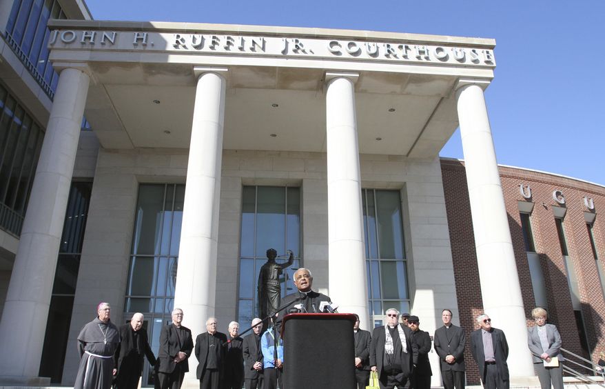 Archbishop Wilton Gregory of the Archdiocese of Atlanta speaks during a news conference at the Richmond County Courthouse on Tuesday, Jan. 31, 2017, in Augusta, Ga. The Archbishop along with bishops Felipe Estevez and Gregory Hartmayer gathered to ask the district attorney to not seek the death penalty in the case against Steven James Murray, who is charged with the killing of the Rev. Rene Robert. . (AP Photo/Heidi Heilbrunn)