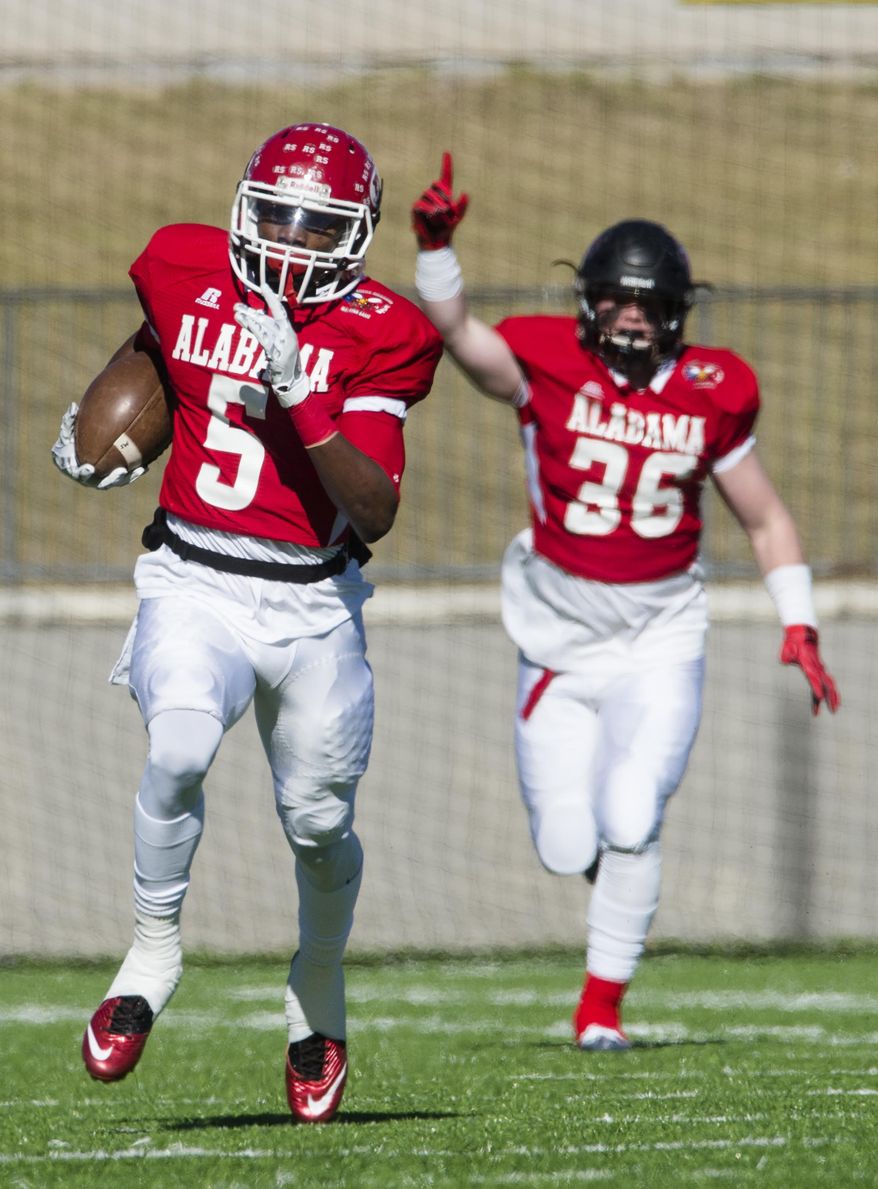 FILE- In this Dec. 10, 2016, file photo, Alabama All Star Henry Ruggs, III of R. E. Lee, returns a kick off for a touchdown during the Alabama vs. Mississippi All-Star high school football game at the Cramton Bowl in Montgomery, Ala. This season’s five-star college football recruits are a committed group. There are 32 players who have a five-star rating on 247Sports’ composite rankings and only four enter signing day uncommitted.(Albert Cesare/The Montgomery Advertiser via AP, File)