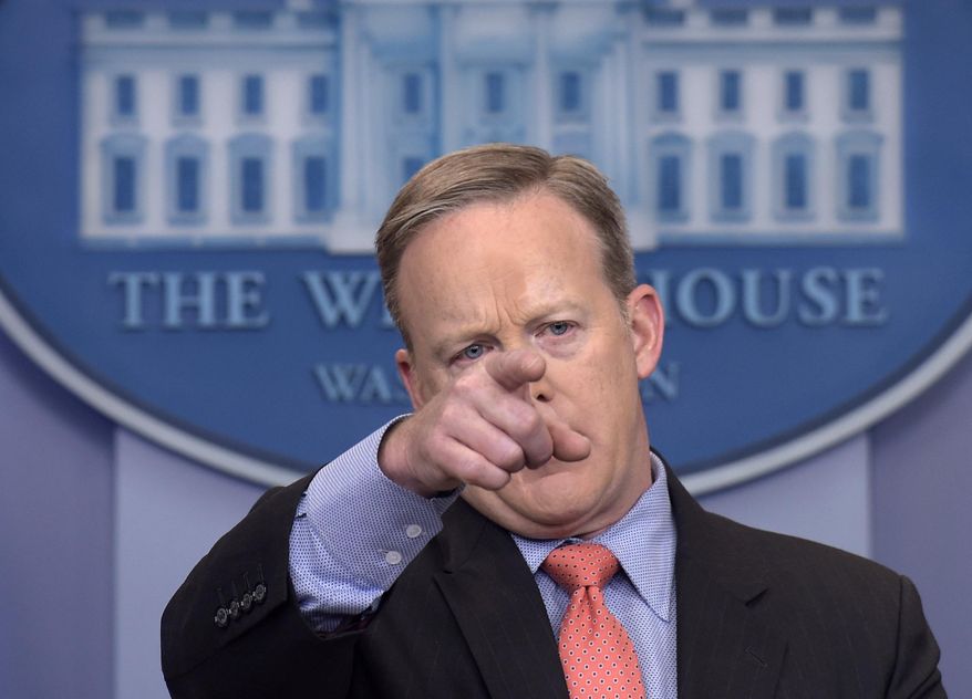 White House press secretary Sean Spicer calls on a reporter during the daily briefing at the White House in Washington, Tuesday, Jan. 31, 2017. Spicer answered questions about the extreme vetting executive order, the upcoming Supreme court announcement, and other topics. (AP Photo/Susan Walsh)