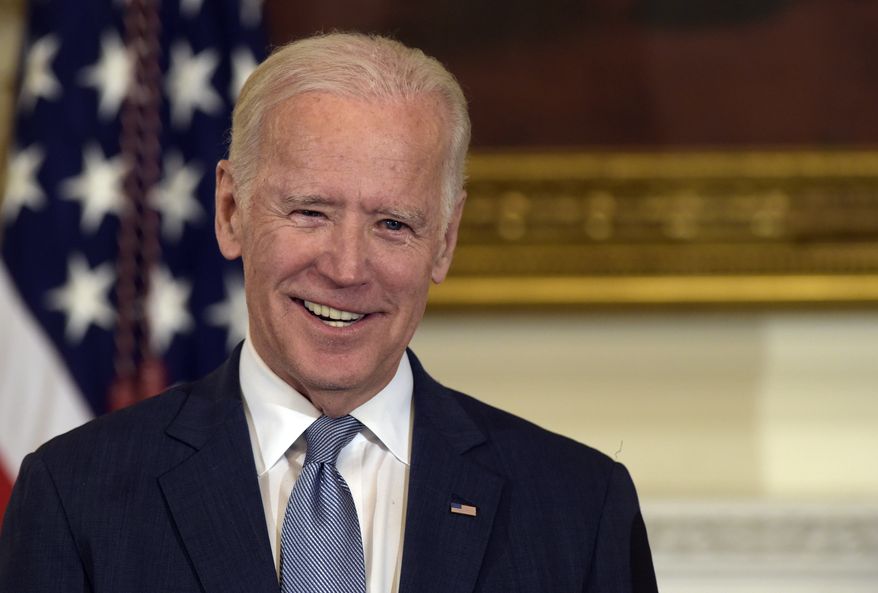 Vice President Joe Biden smiles in the State Dining Room of the White House in Washington, in this Jan. 12, 2017, file photo. (AP Photo/Susan Walsh, File)