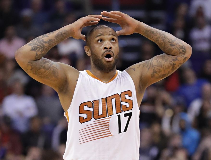 Phoenix Suns forward P.J. Tucker (17) reacts to a call during the second half of the team's NBA basketball game against the Los Angeles Clippers, Wednesday, Feb. 1, 2017, in Phoenix. (AP Photo/Matt York)