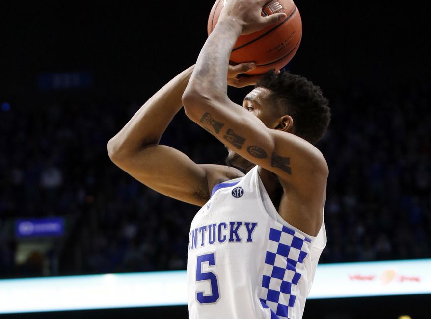 Kentucky's Malik Monk hit this shot at the end of regulation to send the game against Georgia into overtime during an NCAA college basketball game, Tuesday, Jan. 31, 2017, in Lexington, Ky. Kentucky won 90-81 in overtime. (AP Photo/James Crisp)