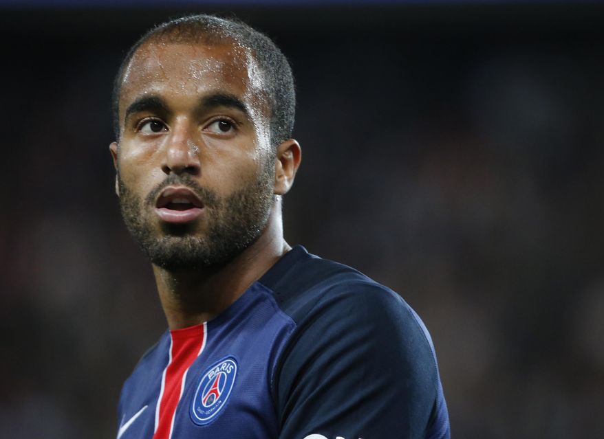 FILE - In this Sunday, Aug. 16, 2015, file photo, Paris saint Germain's Lucas Moura is seen during his French League one soccer match between Paris Saint Germain and Ajaccio Gazelec, at the Parc des Princes stadium in Paris, France. The Brazilian winger Lucas is finally fulfilling his potential for Paris Saint-Germain, five years after joining as an intimated teen with a big price tag weighing him down. Lucas netted his 11th goal of the season in Wednesday night’s 4-0 French Cup win against Rennes. (AP Photo/Jacques Brinon, File)