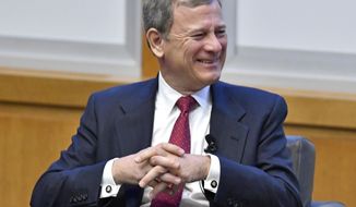 Chief Justice John Roberts reacts to a question from during panel discussion at the The John G. Heyburn II Initiative and University of Kentucky College of Law&#x27;s judicial conference and speaker series, Wednesday, Feb. 1, 2017, in Lexington, Ky. (AP Photo/Timothy D. Easley)