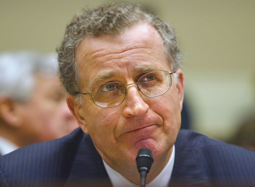 FILE - In this Feb. 11, 2004, file photo, NFL Commissioner, Paul Tagliabue testifies before the Energy and Commerce Committee on Capitol Hill in Washington. Former NFL Commissioner Paul Tagliabue is apologizing for remarks he made decades ago about concussions in football. In an interview with the Talk of Fame Network that airs nationwide Wednesday night, Feb. 1, 2017, he admitted he erred in 1994 in saying concussions were "one of those pack-journalism issues." He also claimed the number of concussions "is relatively small; the problem is the journalist issue." (AP Photo/Lawrence Jackson, File)