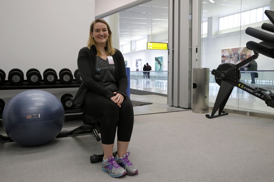 In this Jan. 30, 2017 photo, ROAM Fitness CEO Cynthia Sandall poses inside the soon-to-be-open ROAM Fitness gym at Baltimore-Washington International Thurgood Marshall Airport in Linthicum, Md. Working out while waiting for your flight will soon be an option at BWI, where the only gym at a U.S. airport past security will open this week, with plans for 20 more at airports by 2020. (AP Photo/Patrick Semansky)
