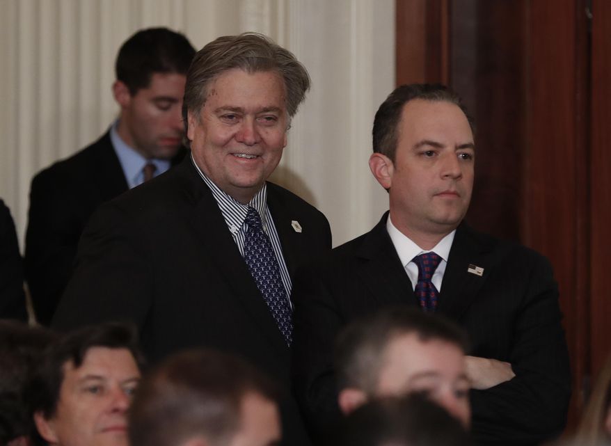 Steve Bannon, chief White House strategist to President Donald Trump, left, and White House Chief of Staff Reince Priebus stand in the East Room of the White House in Washington, Tuesday, Jan. 31, 2017, before President Donald Trump arrives to announce Judge Neil Gorsuch as his nominee for the Supreme Court. (AP Photo/Carolyn Kaster)