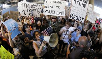 When President Trump arrives in Florida for the weekend, protesters have planned a &quot;March to Mar-a-Lago for Humanity&quot; to greet him. (Associated Press)