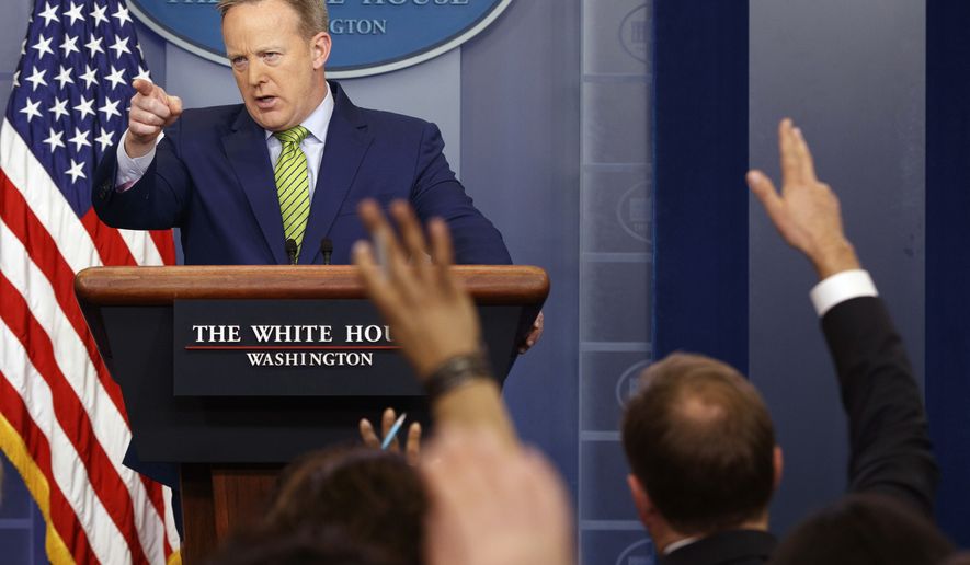 White House press secretary Sean Spicer calls on a reporter during the daily press briefing, Thursday, Feb. 2, 2017, in the briefing room of the White House in Washington. (AP Photo/Evan Vucci)