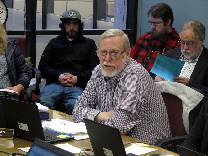 Alaska Marijuana Control Board member Loren Jones speaks during a board meeting on Thursday, Feb. 2, 2017, in Juneau, Alaska. The board is expected to consider rules for allowing authorized retail pot shops to have areas where customers can consume marijuana products. (AP Photo/Becky Bohrer)