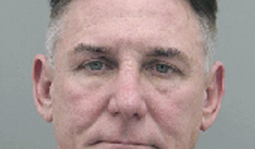 This undated booking photo provided by the Henderson Police Department shows Gregory Brent Dennis. Dennis a Nevada psychologist has been arrested in the death of his lawyer's wife two years ago. Henderson police said Dennis was arrested Thursday, Feb. 2, following a lengthy investigation. (Henderson Police Department via AP)