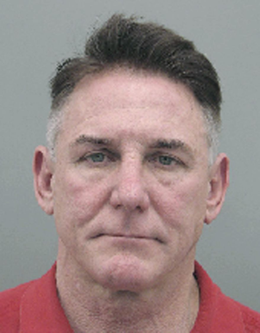 This undated booking photo provided by the Henderson Police Department shows Gregory Brent Dennis. Dennis a Nevada psychologist has been arrested in the death of his lawyer's wife two years ago. Henderson police said Dennis was arrested Thursday, Feb. 2, following a lengthy investigation. (Henderson Police Department via AP)