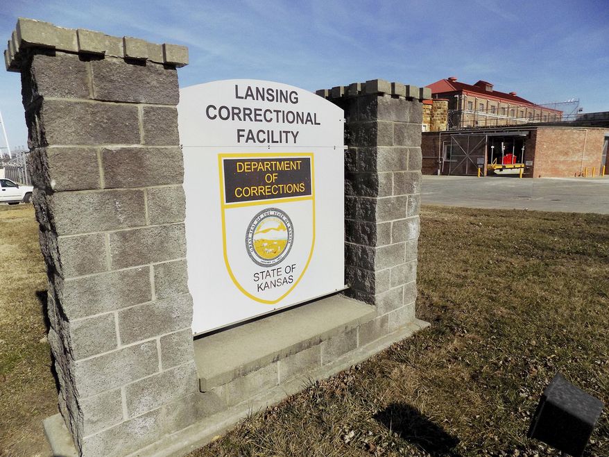 The exterior of the Lansing Correctional Center is seen Thursday, Feb. 2, 2017, in Lansing, Kan. Kansas corrections officials said Thursday, Feb. 2, 2017, that they are considering replacing the state's largest prison with a modern facility that would be safer and cheaper to maintain. (Mark Rountree/The Leavenworth Times via AP)