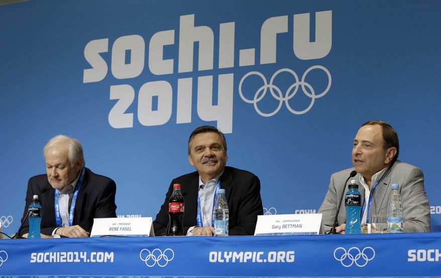 FILE - In this Feb. 18, 2014, file photo, NHL Players' Association Executive Director Don Fehr, left, International Ice Hockey Federation President Rene Fasel, center, and NHL Commissioner Gary Bettman, right, answer questions during a news conference at the 2014 Winter Olympics in Sochi, Russia. Two people familiar with the gathering say the three key decision-makers are meeting Friday, Feb. 3, 2017, regarding the NHL's participation in the 2018 Olympics in South Korea. The person, who spoke Thursday, Feb. 2, 2017, to The Associated Press on condition of anonymity because an announcement was not made about the development, says the IOC and IIHF requested the meeting. (AP Photo/Mark Humphrey, File)
