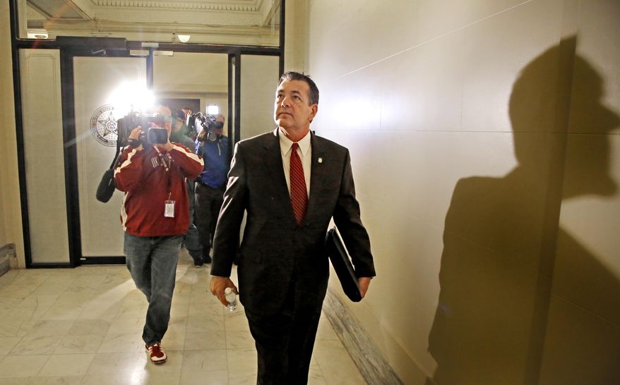 State Rep. Dan Kirby, accused of sexually harassing two former legislative assistants, arrives to testify before a special House committee that is investigating sexual harassment accusations against him at the State Capitol in Oklahoma City, Friday, Jan. 27 2017. (Steve Gooch/The Oklahoman via AP)