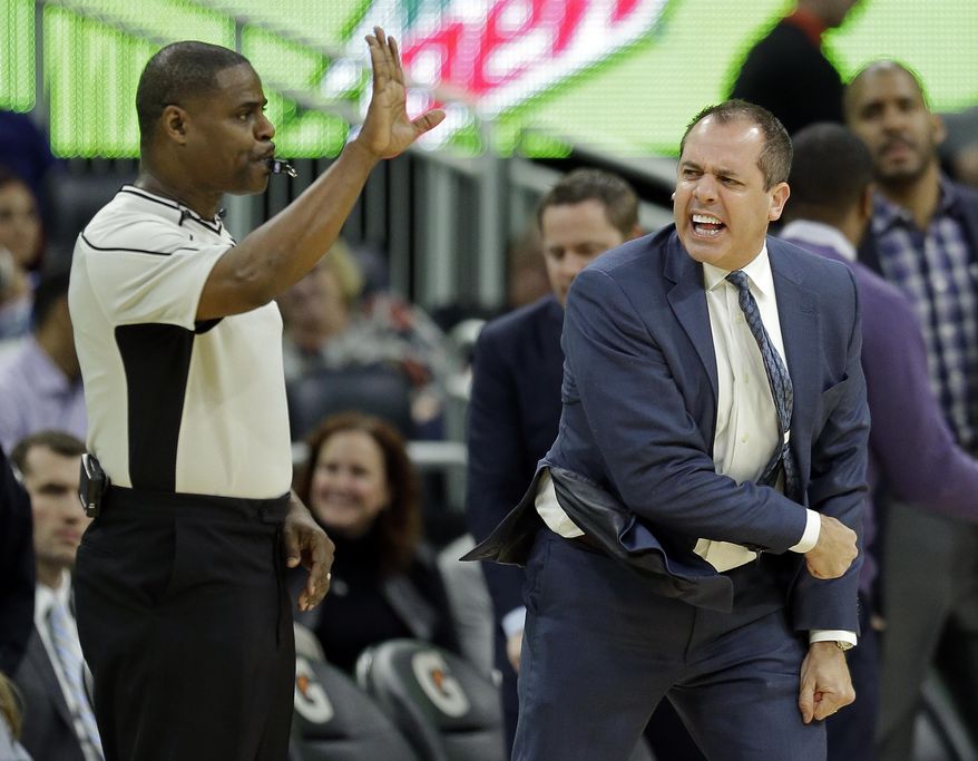 Orlando Magic coach Frank Vogel, right, draws a technical foul after he voiced his displeasure with a call by official Leroy Richardson, left, during the second half of the team's NBA basketball game against the Indiana Pacers, Wednesday, Feb. 1, 2017, in Orlando, Fla. Indiana won 98-88. (AP Photo/John Raoux)