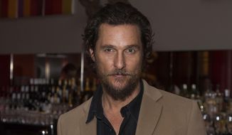 Actor Matthew McConaughey poses for photographers upon arrival at the screening of the film &quot;Gold.&quot; in London in this Jan. 20, 2017, file photo. McConaughey told the BBC for an interview posted online on Jan. 29, 2017, that it’s time for Hollywood to “embrace and shake hands” with the fact that Donald Trump is president. (Photo by Vianney Le Caer/Invision/AP, File)
