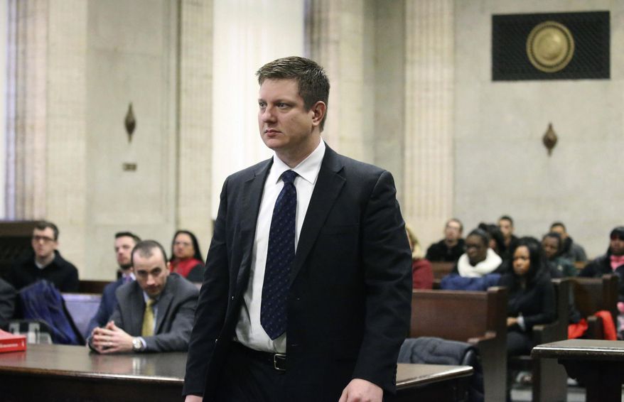 Chicago police officer Jason Van Dyke attends a status hearing at the Leighton Criminal Court building in Chicago, Friday, Feb. 3, 2017. Van Dyke is in court on charges of first-degree murder in the shooting of Laquan McDonald. (Antonio Perez /Chicago Tribune via AP, Pool)