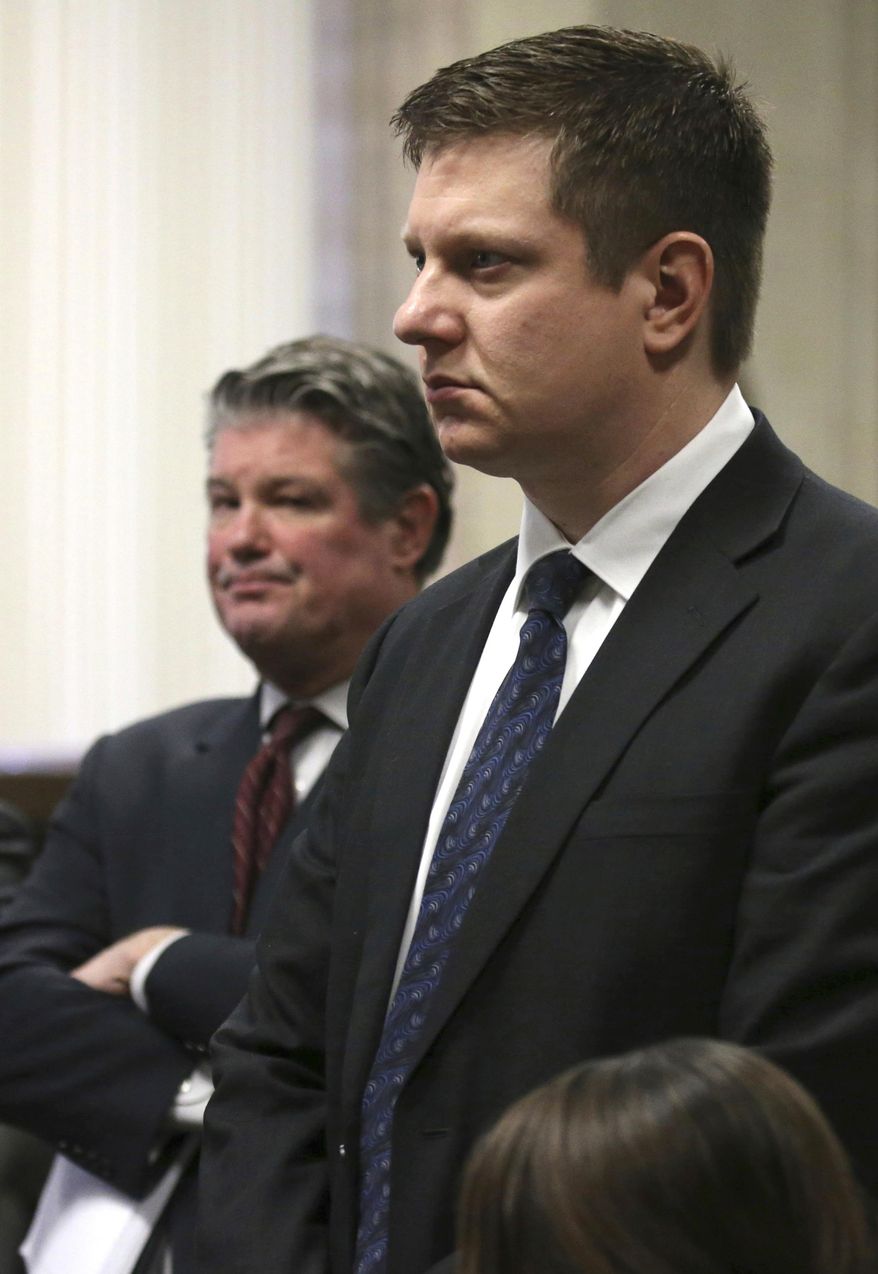 Chicago police officer Jason Van Dyke attends a status hearing at the Leighton Criminal Court building, in Chicago, Friday, Feb. 3, 2017. Van Dyke is in court on charges of first-degree murder in the shooting of Laquan McDonald. (Antonio Perez /Chicago Tribune via AP, Pool)