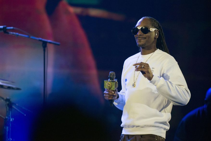 Snoop Dogg performs at the EA Sports Bowl at Club Nomadic on Thursday, Feb. 2, 2017 in Houston. (Photo by Peter Barreras/Invision/AP) ** FILE **