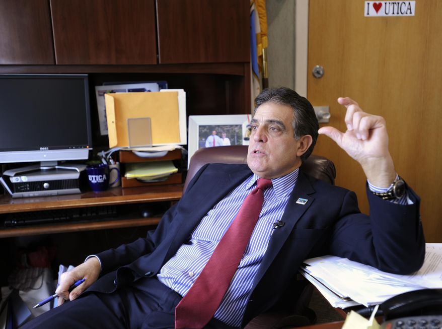 In this Jan. 31, 2017 photo, City of Utica Mayor Robert M. Palmieri talks about the contributions the refugee population has made to the community, in Utica, N.Y. Utica has been a refugee "oasis" for decades. Vietnamese, Bosnians, Somalians and Burmese have each found shelter in the city that has benefited from the infusion of house-proud residents who work in hospitals, factories and their own businesses. But now President Donald Trump's executive order crimping the flow of refugees has sent a shudder through the city. (AP Photo/Hans Pennink)