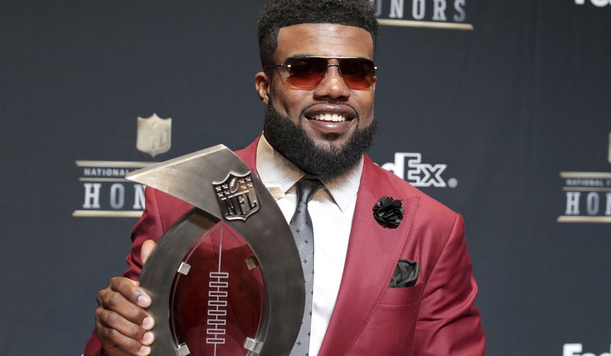 Ezekiel Elliott of the Dallas Cowboys poses in the press room with the FedEx Air &amp; Ground Award at the 6th annual NFL Honors at the Wortham Center on Saturday, Feb. 4, 2017, in Houston. (Photo by Jeff Lewis/Invision for NFL via AP)