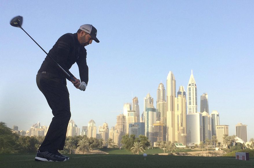Sergio Garcia of Spain tees off on the 8th hole during the second round completion of the Dubai Desert Classic golf tournament in Dubai, United Arab Emirates, Saturday, Feb. 4, 2017. (AP Photo/Kamran Jebreili)