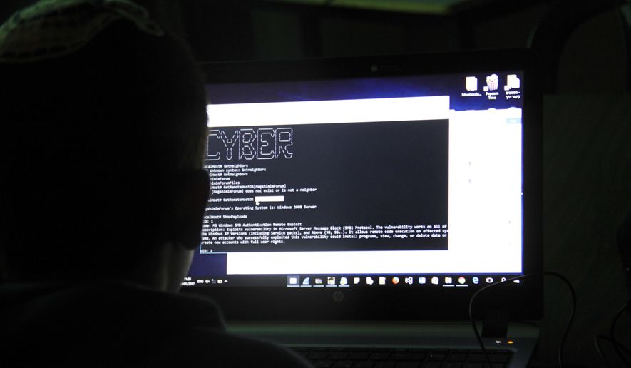 This photo made on Sunday Jan.1, 2017, shows a tenth grader attending a class how to investigate a computer network that has been hacked in Beit Shemesh, Israel. In its quest to become a world leader in cyber security and technology, Israel is placing its hopes in the country&#39;s youth. (AP Photo/Daniel Estrin)
