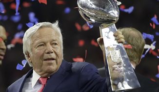 New England Patriots owner Robert Kraft holds the the Vince Lombardi Trophy after the NFL Super Bowl 51 football game Sunday, Feb. 5, 2017, in Houston. (AP Photo/Elise Amendola)