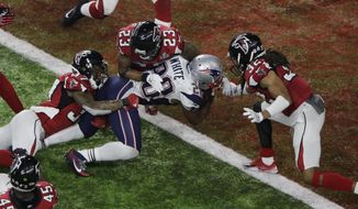 New England Patriots&#39; James White scores the winning touchdown during overtime of the NFL Super Bowl 51 football game against the Atlanta Falcons, Sunday, Feb. 5, 2017, in Houston. (AP Photo/Charlie Riedel)