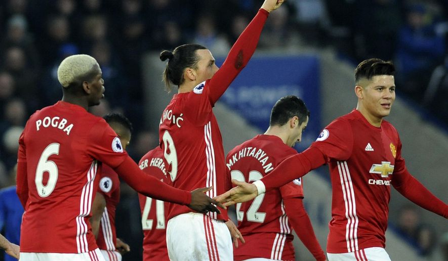 Manchester United&#x27;s Zlatan Ibrahimovic, center, celebrates with teammates after scoring his side&#x27;s second goal during the English Premier League soccer match between Leicester City and Manchester United at the King Power Stadium in Leicester, England, Sunday, Feb. 5, 2017. (AP Photo/Rui Vieira)