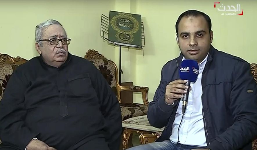 In this still image made from video provided by the Dubai-based news channel al-Hadath, the father of the alleged Louvre attacker, Egyptian-born Abdullah Reda Refaie al-Hamahmy, 28, Reda Refae al-Hamahmy, left, gives an interview to al-Hadath, in his Nile Delta home, aired Saturday, Feb. 4, 2017, in which he said he was shocked to learn of his son's alleged involvement. "All I want is to know the truth and find out whether he is dead or alive," the father said. "I am desperate to know whether he is dead or alive."