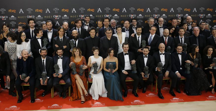 Goya Film Awards winners pose with their trophies for a family photo at the end of the Goya Film Awards Ceremony in Madrid, Sunday, Feb. 5, 2017. The Goya Awards are Spain's main national annual film awards. (AP Photo/Francisco Seco)
