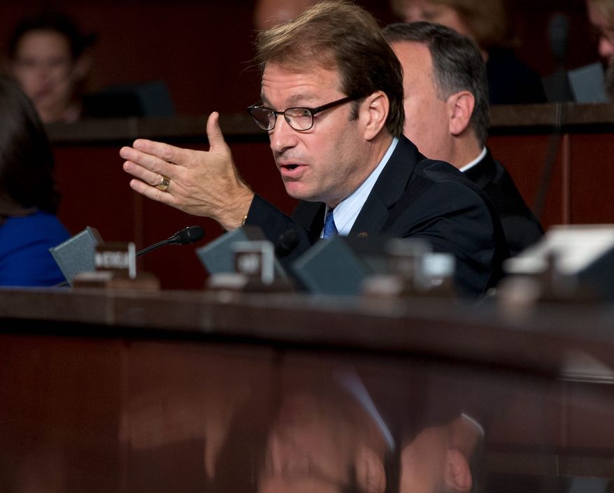 "I think a year from now we're going to be celebrating this tax reform act," Illinois Rep. Peter Roskam said Monday in a speech to the Heritage Foundation. (Associated Press)