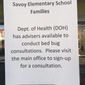 A sign posted at Savoy Elementary School warns parents about pest problems, but the school remains open. (Deborah Simmons/The Washington Times)