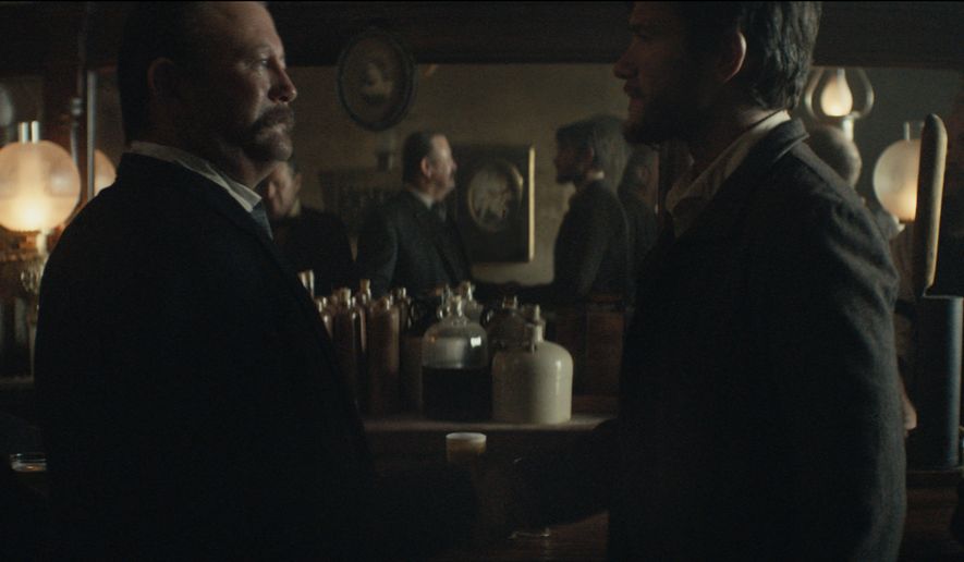 This photo provided by Budweiser shows a scene from the company&#x27;s spot for Super Bowl 51. The scene depicts when Anheuser-Busch co-founder Adolphus Busch, right, after traveling by boat from Germany, met fellow immigrant Eberhard Anheuser. The New England Patriots defeated the Atlanta Falcons, 34-28, in overtime, in Super Bowl 51, on Sunday, Feb. 5, 2017. (Budweiser via AP)