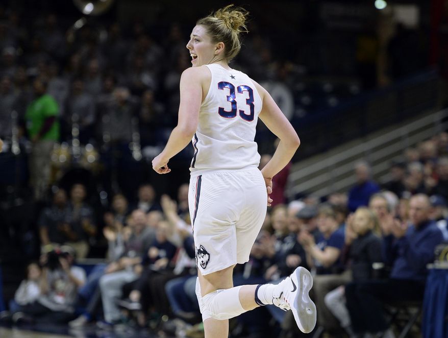 Connecticut&#39;s Katie Lou Samuelson smiles as she runs upcourt after scoring a basket against Tulsa in the second of an NCAA college basketball game, Sunday, Feb. 5, 2017, in Storrs, Conn. (AP Photo/Jessica Hill)