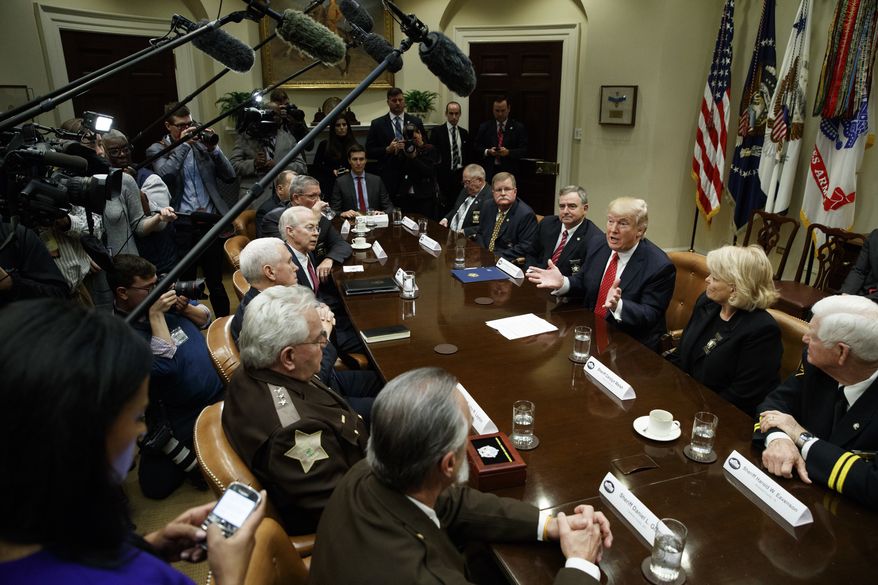 President Donald Trump speaks during a meeting with county sheriffs in the Roosevelt Room of the White House in Washington, Tuesday, Feb. 7, 2017. (AP Photo/Evan Vucci)
