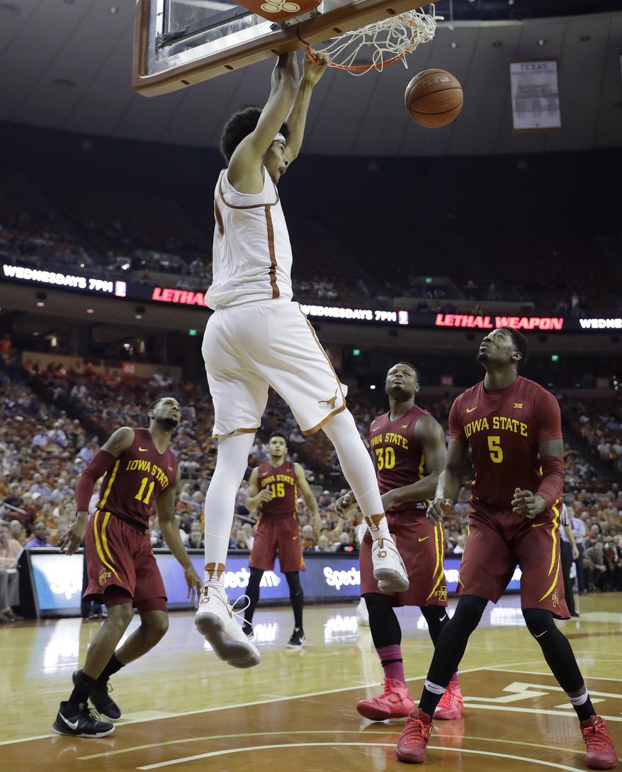 Texas forward Jarrett Allen, center, scored against Iowa State during the second half of an NCAA college basketball game, Tuesday, Feb. 7, 2017, in Texas, Texas. Texas won 67-65. (AP Photo/Eric Gay)