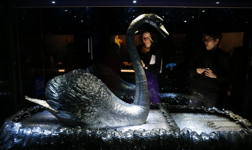 The mechanical Silver Swan dating from 1774 that have three separate clock work mechanisms by John-Joseph Merlin a Belgian clock maker, during a press preview for the Robots exhibition held at the Science Museum in London, Tuesday, Feb. 7, 2017. The exhibition which shows 500 years of mechanical and robotic advances is open to the public form Feb. 8 through to Sept. 3. (AP Photo/Alastair Grant)