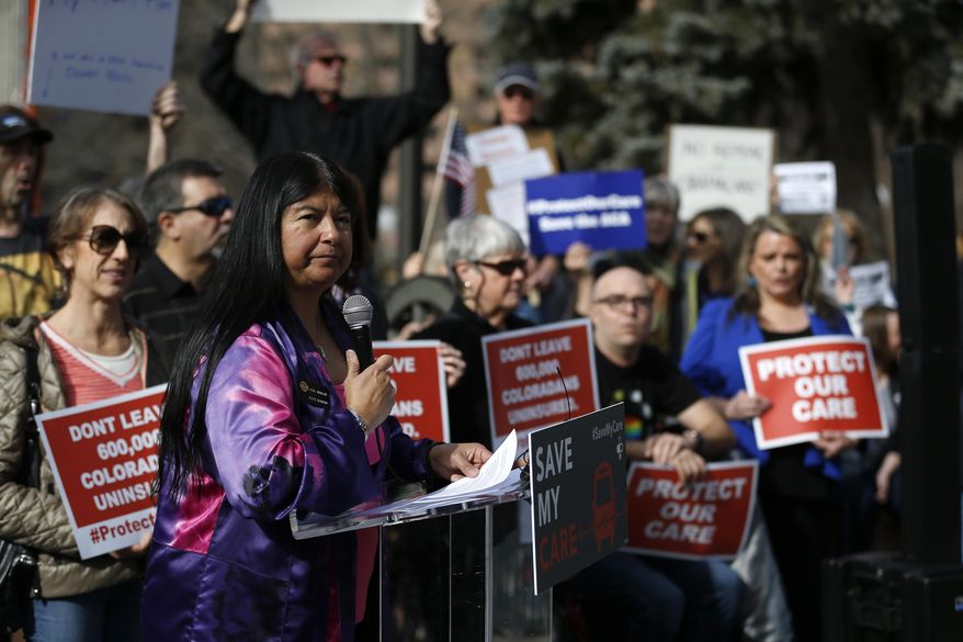 State Sen. Dr. Irene Aguilar, D-Denver, speaks to supporters of the Affordable Care Act who are also opponents of Colorado's GOP-led plan to undo Colorado's state-run insurance exchange during a rally organized by the national Save My Care Bus Tour, on the state Capitol steps in Denver, Tuesday, Feb. 7, 2017. A bill being heard in the Senate Finance Committee would abolish the state-run health insurance exchange. (AP Photo/Brennan Linsley)