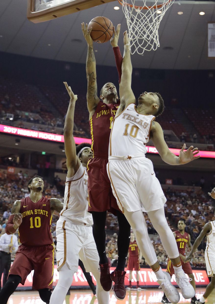 Iowa State guard Nick Weiler-Babb (1) drives to the basket against Texas guard Eric Davis Jr. (10) during the first half of an NCAA college basketball game, Tuesday, Feb. 7, 2017, in Texas, Texas. (AP Photo/Eric Gay)