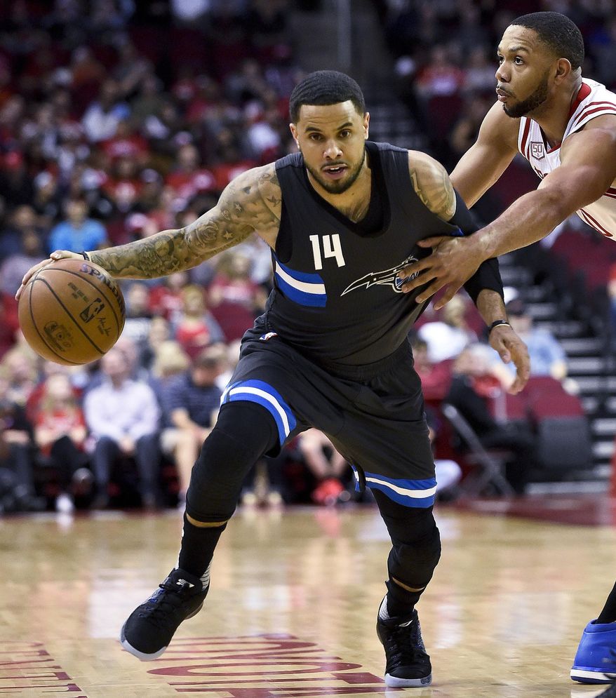 Orlando Magic guard D.J. Augustin (14) is fouled by Houston Rockets guard Eric Gordon in the first half of an NBA basketball game, Tuesday, Feb. 7, 2017, in Houston. (AP Photo/Eric Christian Smith)