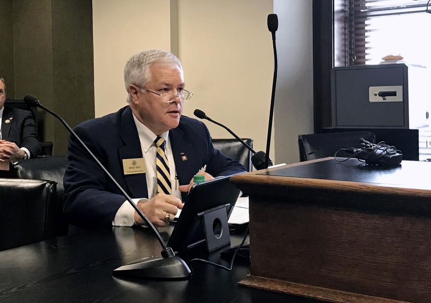 Arkansas state Rep. Brandt Smith, appearing before the House Education Committee at the state Capitol in Little Rock on Tuesday, Feb. 7, 2017, asks the panel to approve a bill that would cut funding for Arkansas colleges and universities that don't cooperate with federal immigration authorities. Panel members rejected the idea in a voice vote. Smith said later he didn't expect to revisit the matter this session. (AP Photo/Andrew DeMillo)
