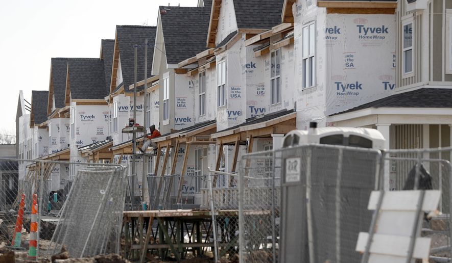 This Monday, Jan. 30, 2017 photo shows new housing under construction in St. Louis. The development is receiving federal low-income housing tax credits. (AP Photo/Jeff Roberson)